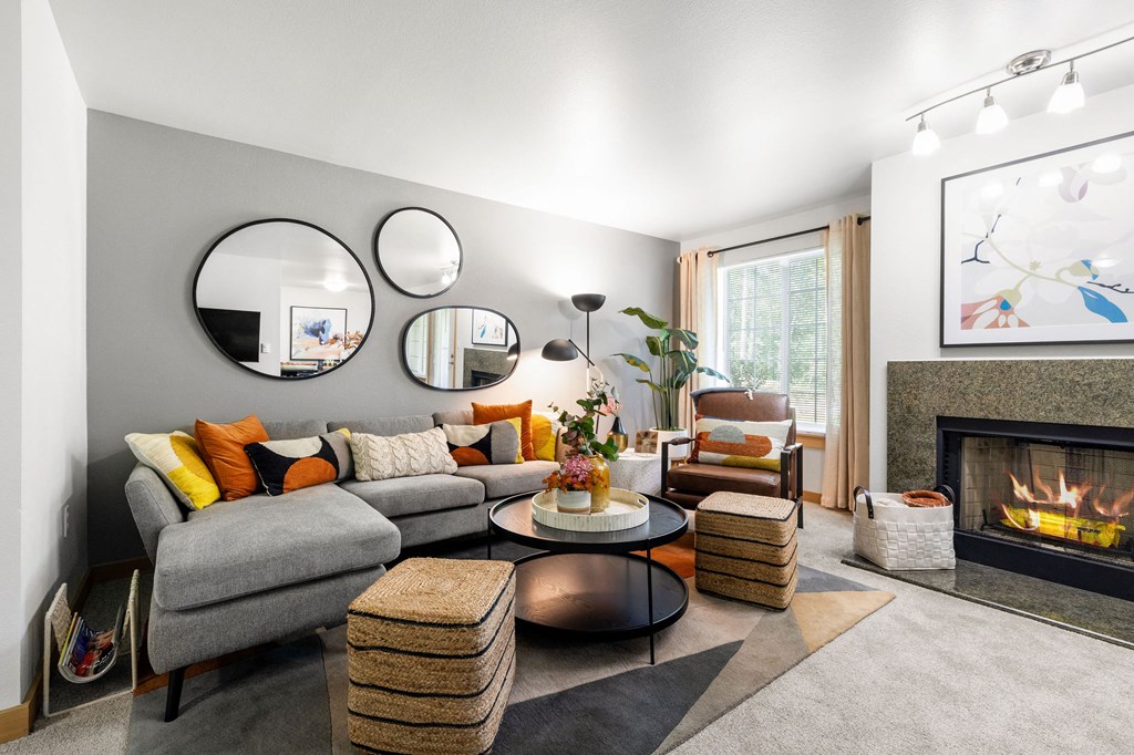 a living room with a gray couch