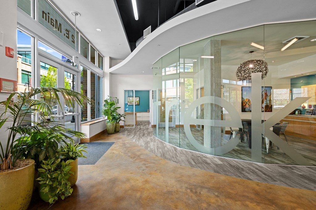 the lobby of a building with a large peace sign in the middle