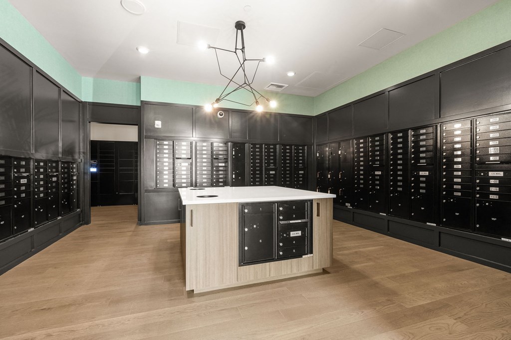 a large wine cellar with a white counter top in the center
