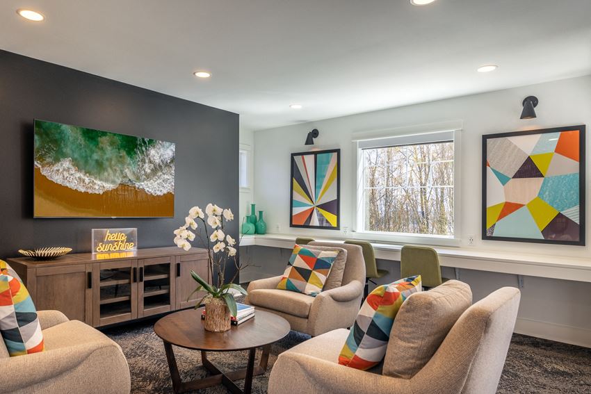 a living room filled with furniture and a large window - Photo Gallery