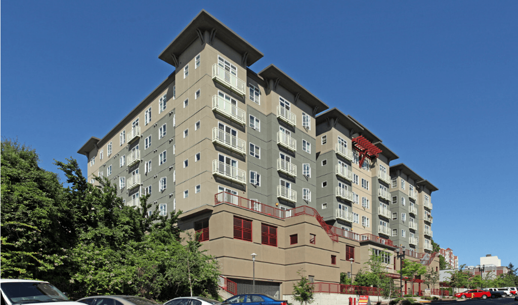 a large apartment building on a city street