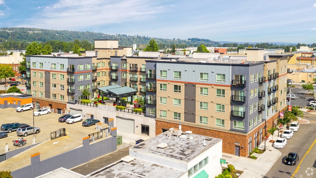 an aerial view of an apartment building in a city