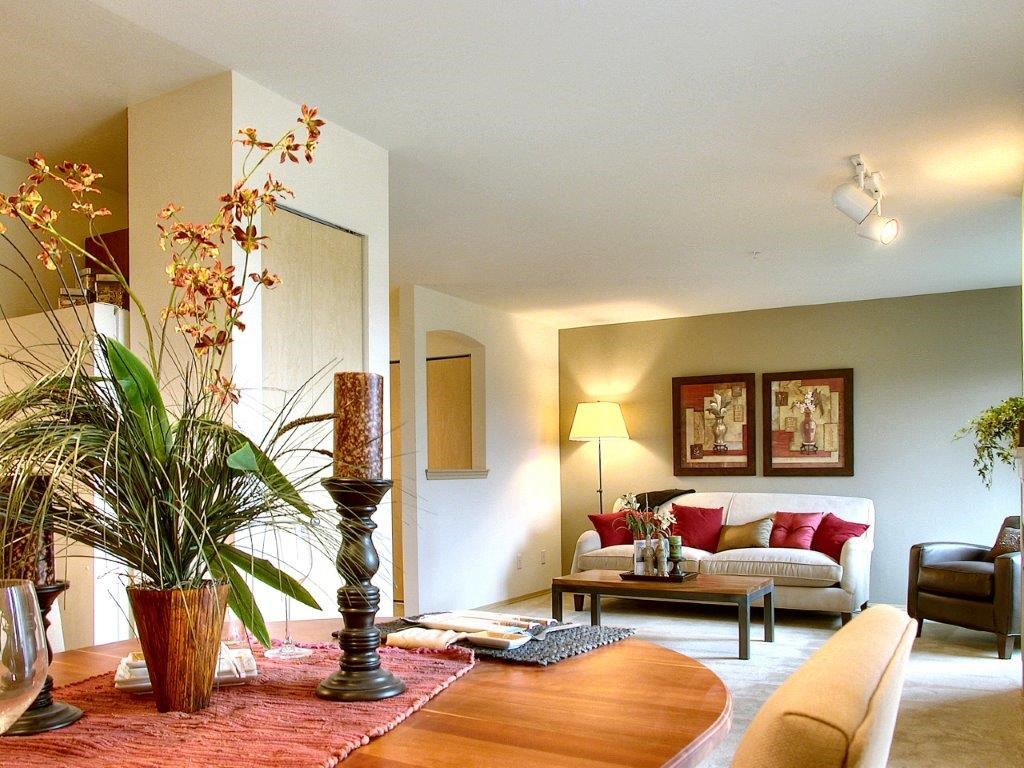 a living room with a couch and a table