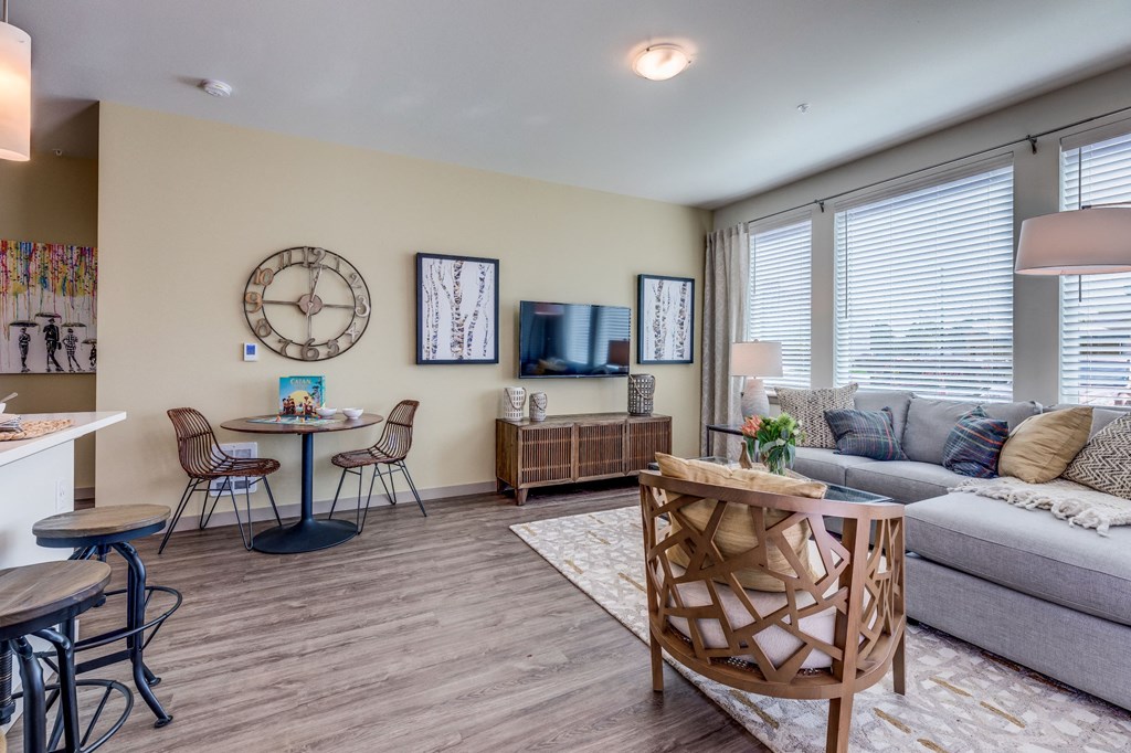 a living room with a couch and a table