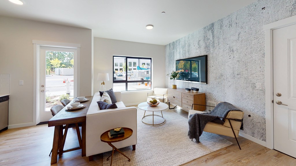 a living room with a couch and a table