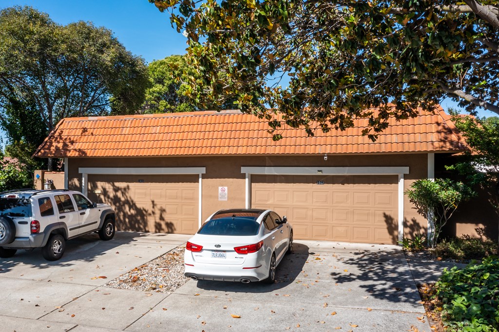 2 cars in front of a garage at Oak Grove Terrace, California