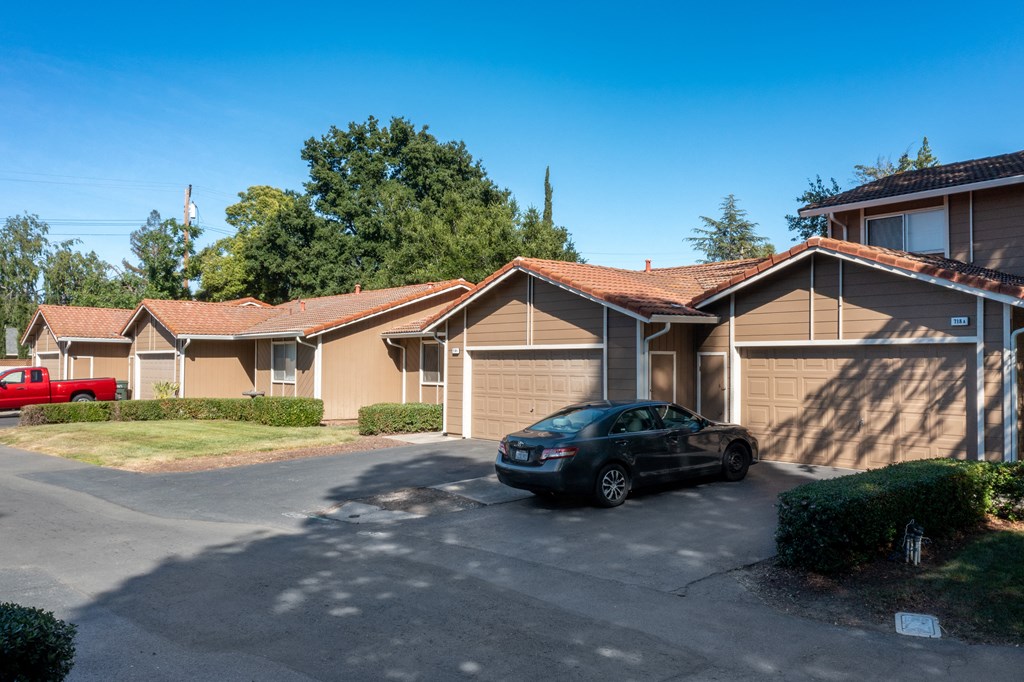 a car parked in front of a row of houses at Oak Grove Terrace, California, Concord, 94518