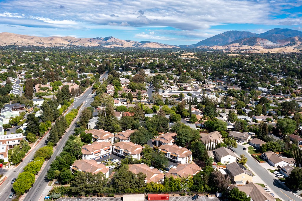 a neighborhood of houses and trees with mountains in the background at Greentree Terrace Apartments, CONCORD, 94521