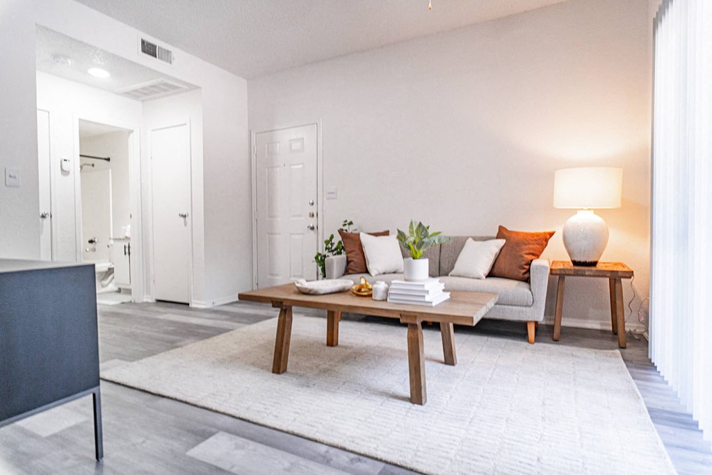 a living room with a couch and a coffee table