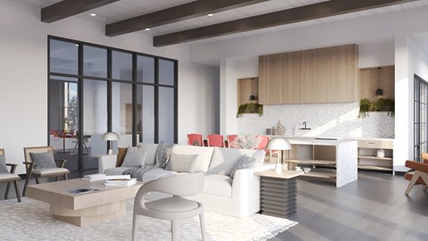 A modern living room with a white sofa and a coffee table.
