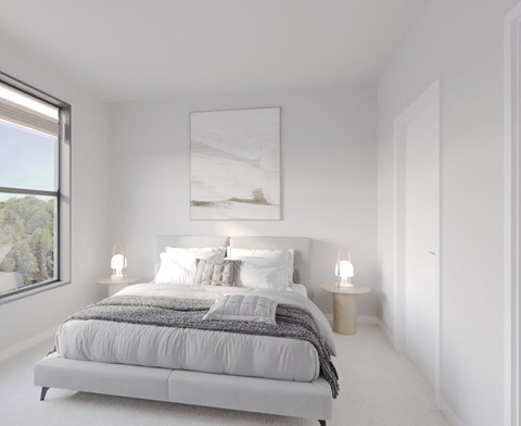 A bedroom with a large bed and a painting on the wall. at Enclave on Ross Apartments, Texas