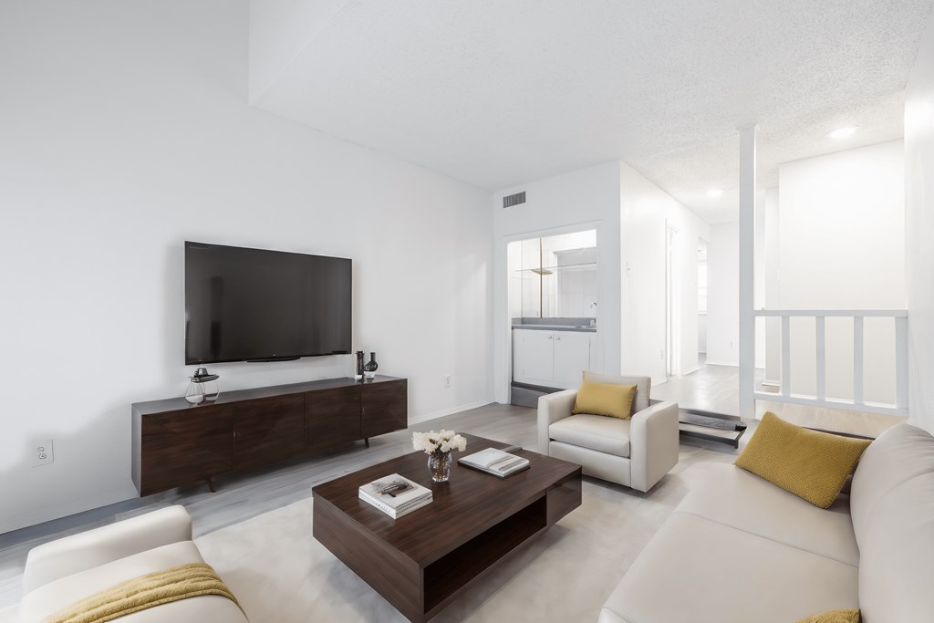 a living room with a couch and a coffee table