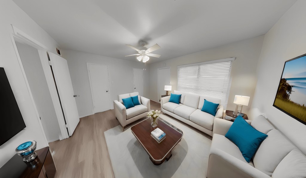 a living room with couches and a coffee table