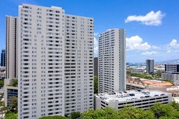 a group of tall buildings sitting next to each other