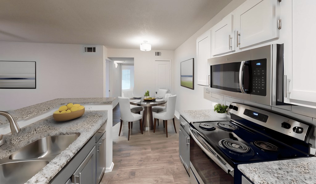 view of kitchen and dining area at the preserve at greatstone apartments in greatstone