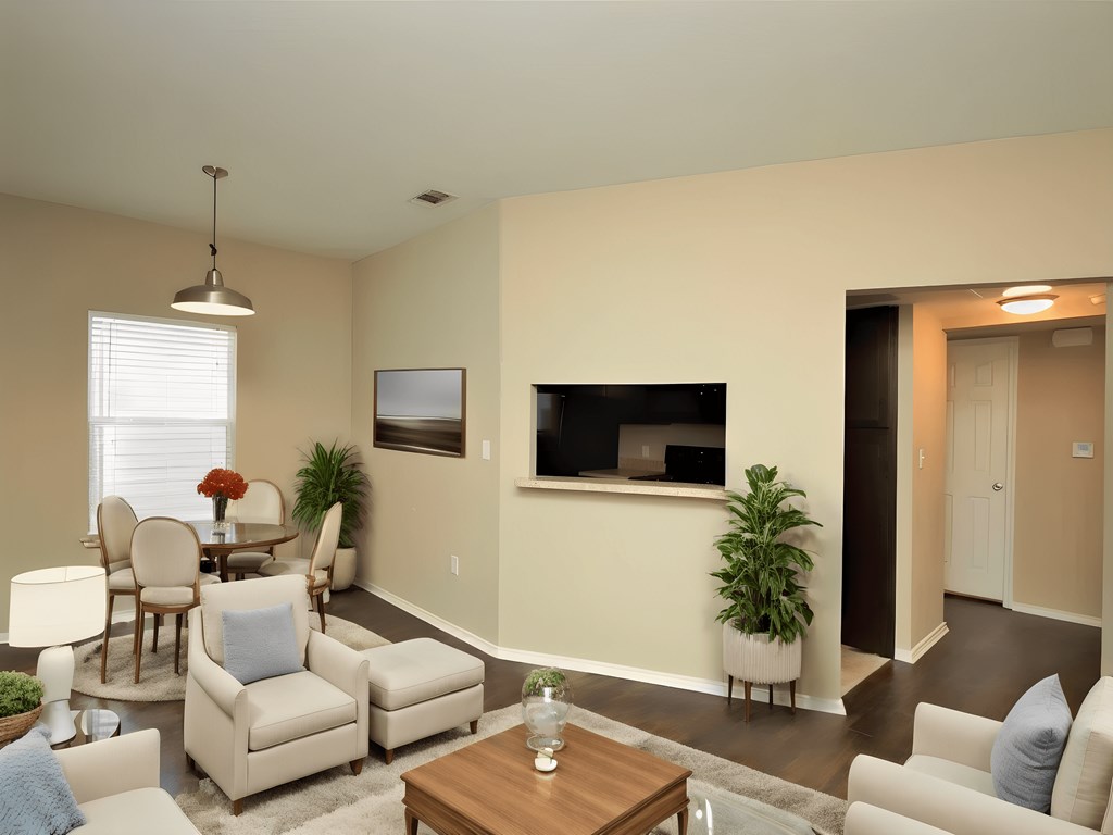 a living room with a couch and a table and a television