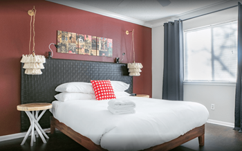 Furnished bedroom Furnished bedroom at Waters at Barton Creek Apartments, Texas - Photo Gallery 4
