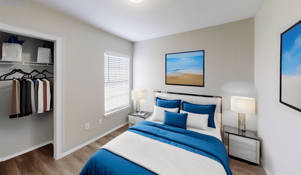 a bedroom with a bed and a closet