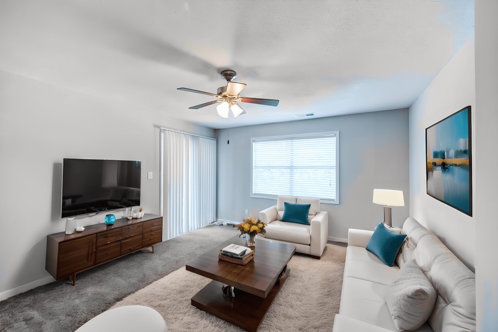 a living room with a couch and a coffee table