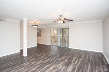 Large living room with ceiling fan at Waters at Barton Creek Apartments, Austin, TX, 78746 - Photo Gallery 3