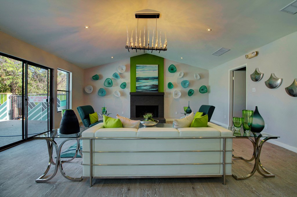 a living room with a couch and a table