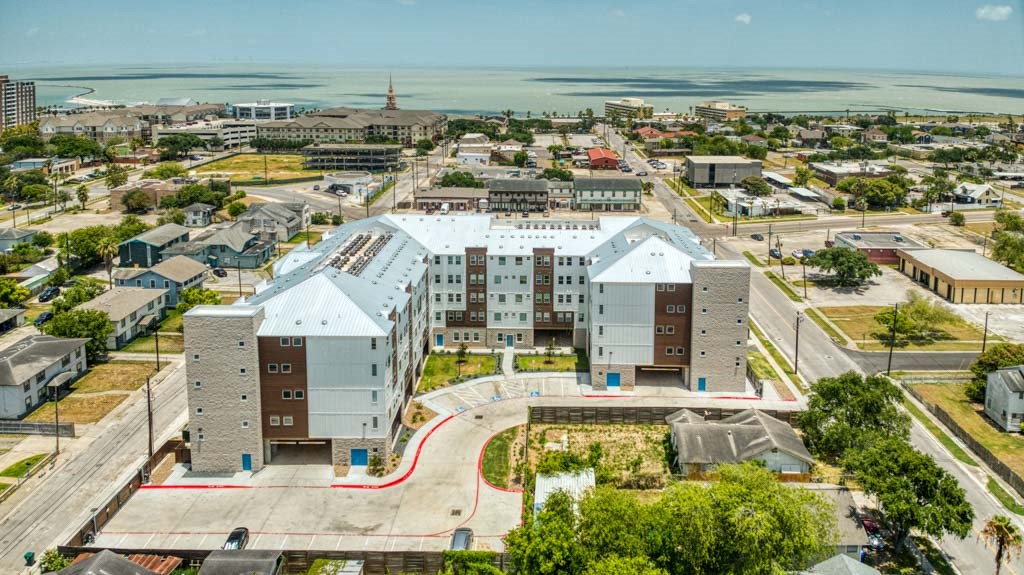 an aerial view of a building in a city
