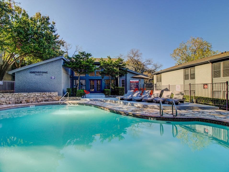 Swimming pool with lounge chairs