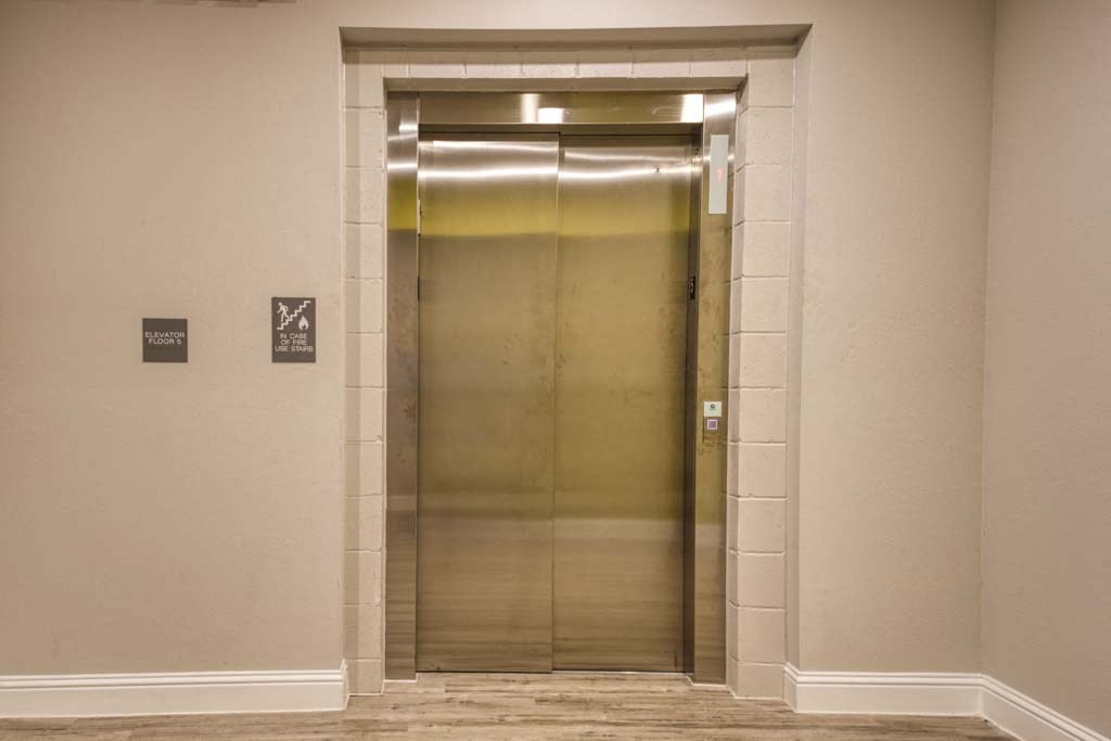 an elevator in a building with its door open