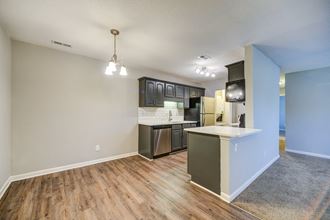 Dining area and kitchen at Triangle Park Apartments, Durham