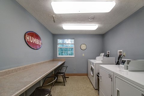 A laundromat with the word "Humble" on the wall.