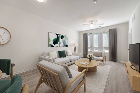 A living room with a sofa set, a coffee table, and a television.