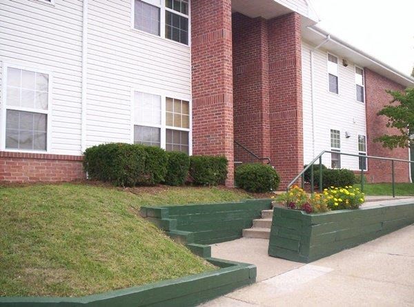 a brick building with steps in front of it