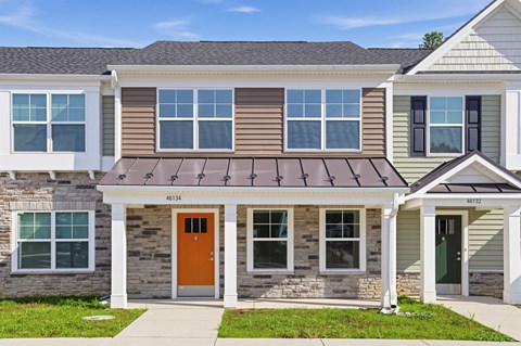 A row of houses with numbers 46134 and 46132 on them.
