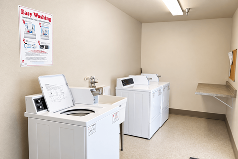 A laundry room with a washing machine and dryer.