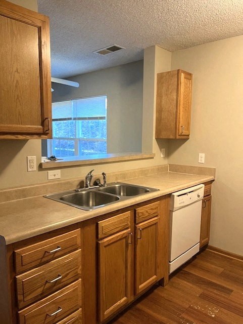 a kitchen with a sink and a window
