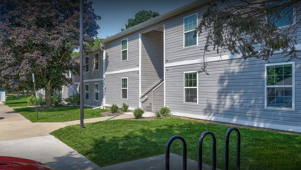apartment building and a sidewalk