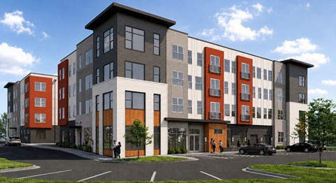 A modern apartment complex with a mix of red, gray, and black colors.