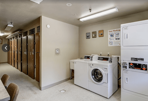 a laundry room with a washer and a dryer in it