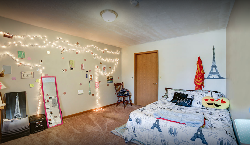 bedroom with bed and lights