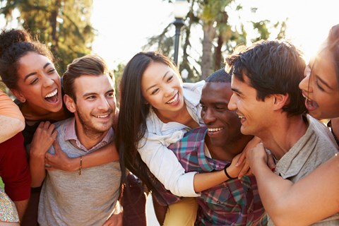 a group of friends hugging each other
