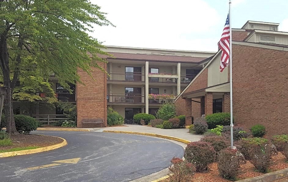 a building with an american flag in front of it