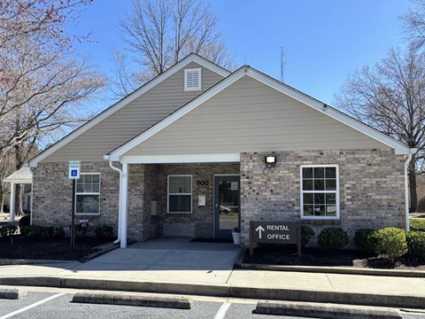 A small building with a sign that says RENTAL OFFICE.