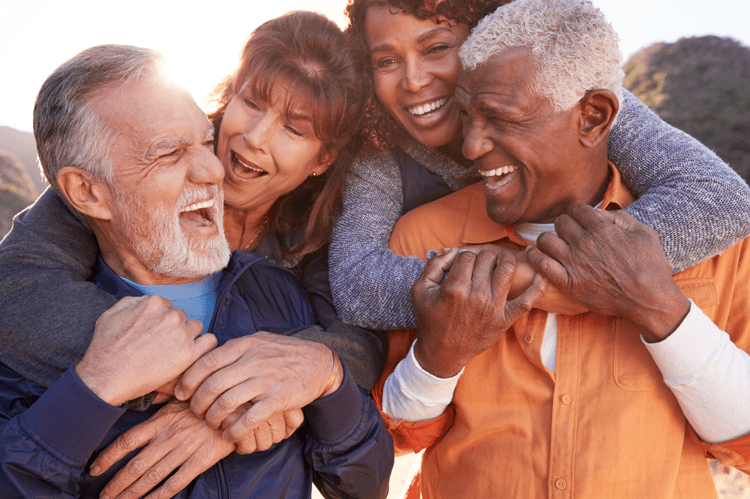 a group of people with their arms around each other