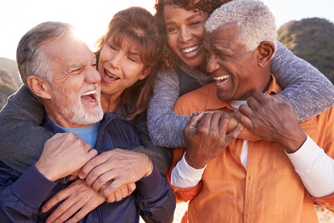 a group of people with their arms around each other