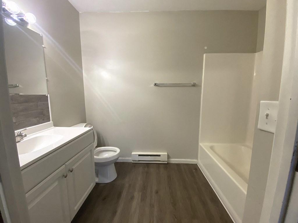 a small bathroom with a toilet and a sink
