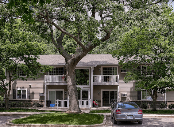 a house with a car parked in front of it