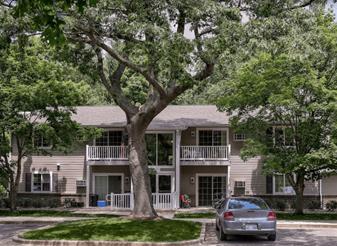 a house with a car parked in front of it