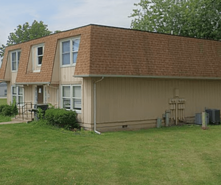 a house with a yard in front of it