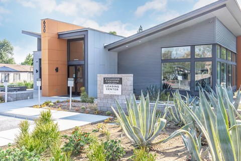 A modern building with a sign that reads "Cycling Center".