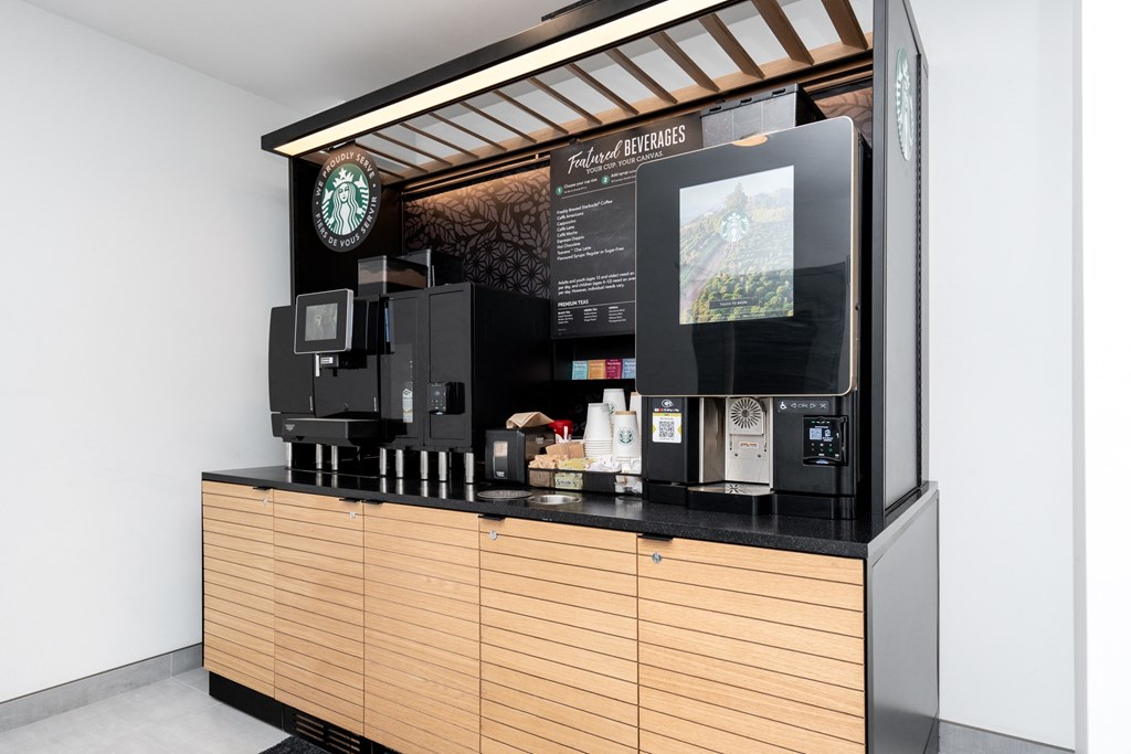 a coffee shop with a counter and a coffee machine
